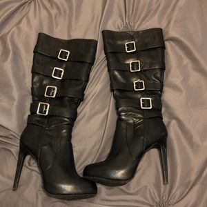 Black heel boots with buckled down the side